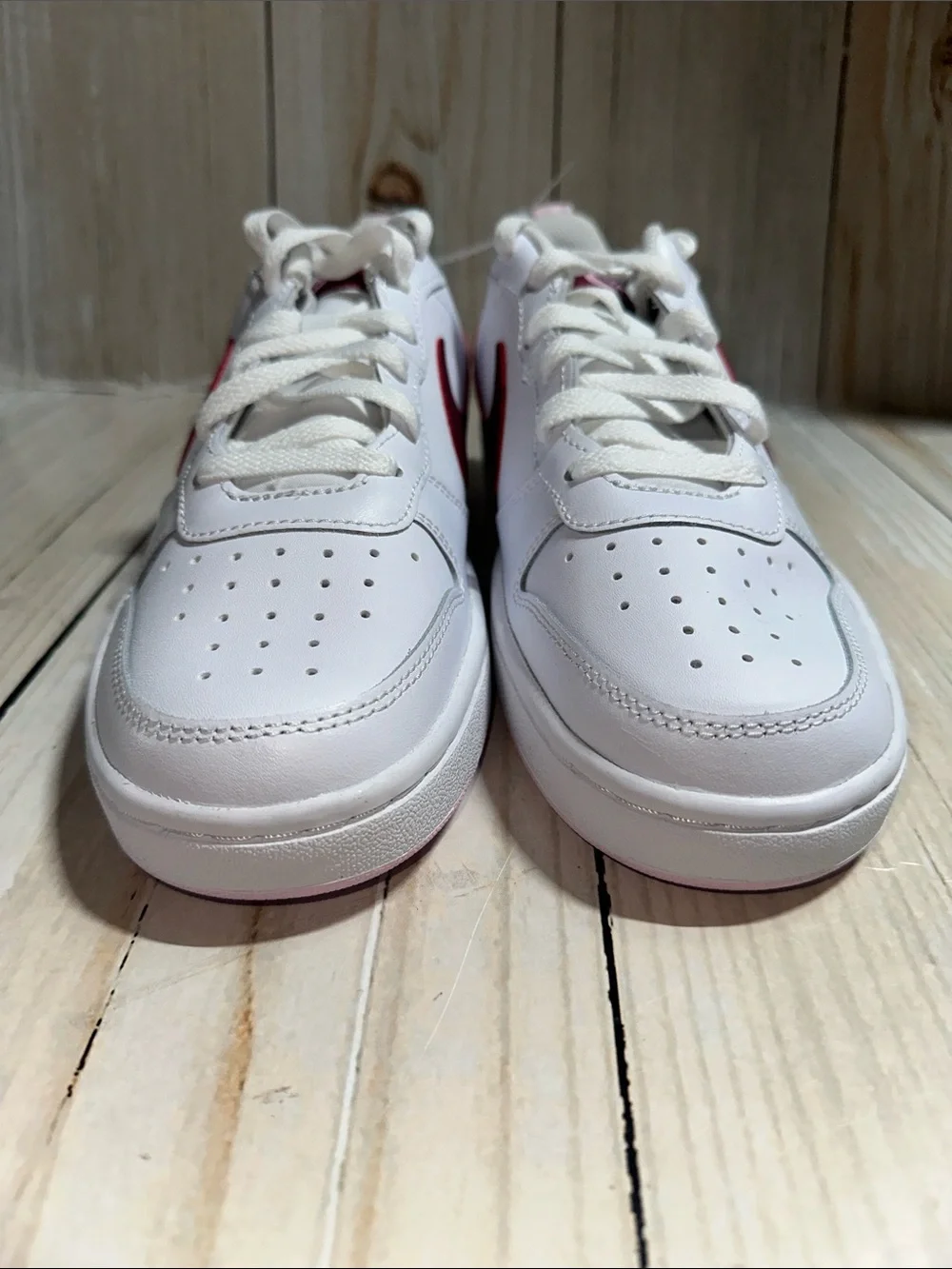 Nike White Sneakers with Maroon Swoosh and Pink Heel Tab